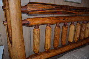 Redwood log post bed preserved and nourished with linseed oil wax.