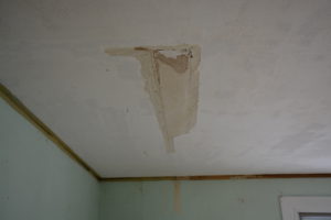 Damaged ceiling from old water leak
