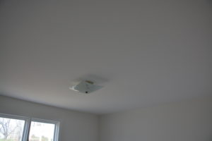 (After) Stucco ceiling sanded and skimmed smooth with plaster and painted